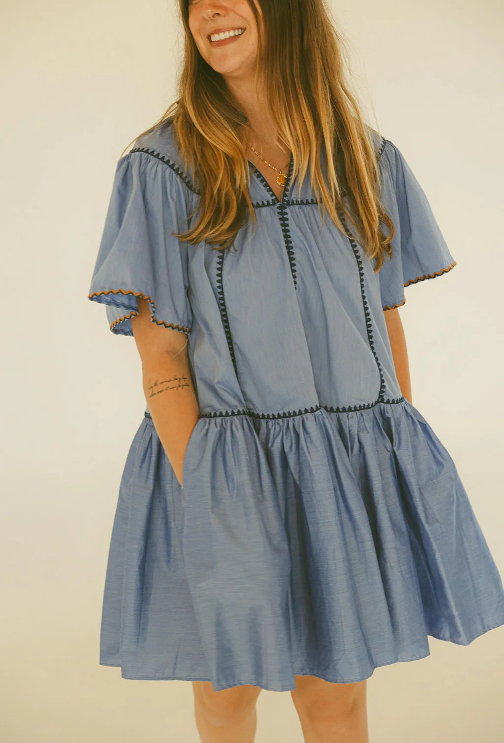 Solid V-Neck Contrast Emb Trim Tier Dress