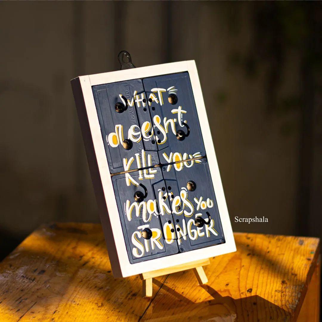 What doesn't kill you makes you stronger | Geet Key Holder | Motivational | Audio Tapes | Upcycled | Scrapshala